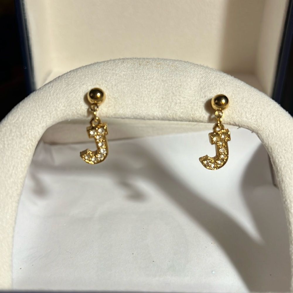 Letter J dangle pierced gold & faux diamond earrings.